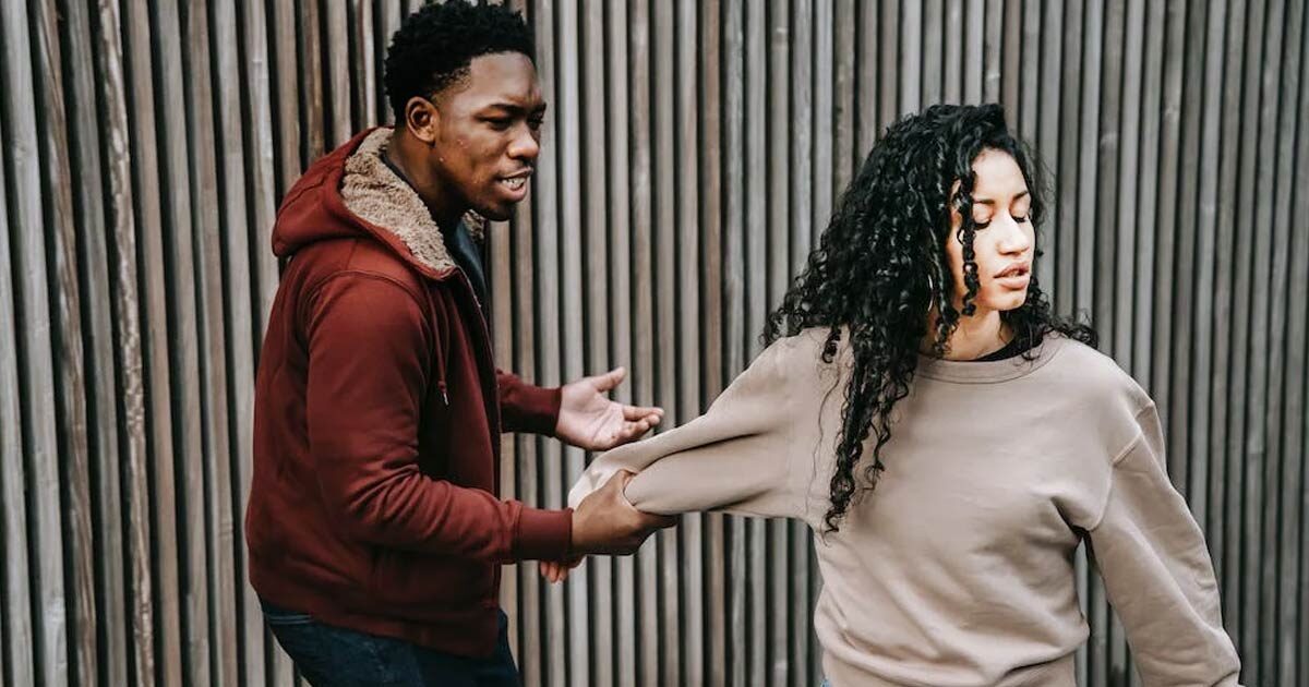 Guy attacking a woman