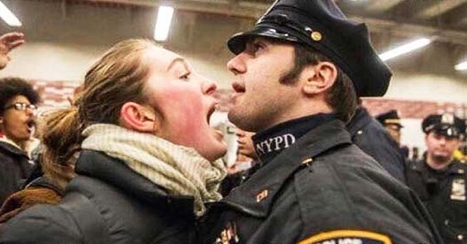 Female Protestor Shouting at a Police Officer