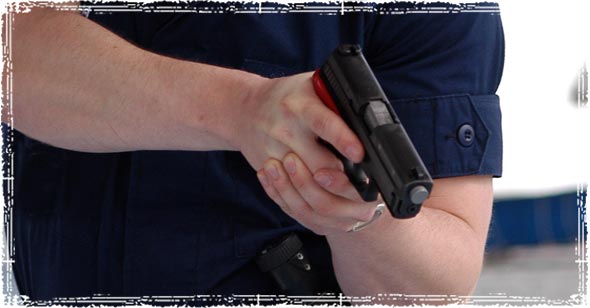 Holding Firearm